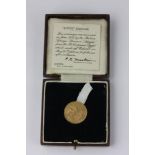An 1880 bun head sovereign in case, with provenance by repute