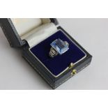 A rose diamond and blue glass dress ring