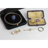An amethyst bar brooch, an aquamarine bar brooch, a silver bangle and three items of costume