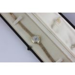 A lady's 9ct gold bracelet watch by Garrard 15.5g