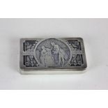 A continental white metal stamp box, hinged lid with scene of a lady musician and gentleman