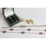 A pair of pearl and diamond drop earrings in 18ct gold, a silver gilt and amethyst paste necklace, a