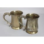 A pair of mid-20th century silver mugs plain baluster form with scroll handles, maker Viners