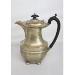 A George VI silver coffee pot oval baluster shape on four button feet, maker S Blanckensee