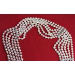 Schoeffel, a six row pearl necklace strung with 7mm pearls, with seed pearls between and five