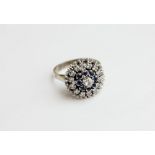 A sapphire and diamond 'ballerin' cluster ring in white gold