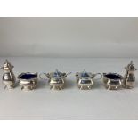 A George V silver six piece cruet set, maker Mappin & Webb, Birmingham 1924, with three matching