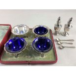 A cased set of four George V silver cauldron salts, makers Barker Brothers, Chester 1911, with