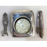 An Edward VII silver faced leather pocket watch case with engraved initials and date, enclosing a