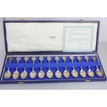 A cased set of twelve John Pinches silver zodiac teaspoons designed by David Cornell, hallmarked