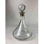 A German silver mounted ships plain glass decanter, stamped 925 sterling