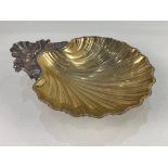 An Elizabeth II silver shell shaped bowl, maker RG, London 1994, with gilt interior, presented,
