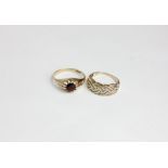 A 14ct gold and diamond ring and a garnet ring