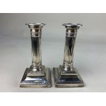 A pair of Edward VII silver column candlesticks, makers Hawksworth, Eyre & Co Ltd, Sheffield 1906,