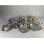 An Elkington & Co silver plated muffin dish, an entree dish, a sauce boat, and other items of silver