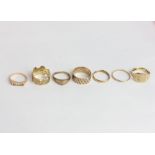 A 9ct three colour gold ring and five other 9ct gold rings 21 g