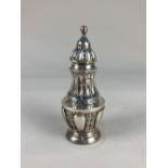 A Victorian silver baluster pepper, maker John Aldwinckle & Thomas Slater, London 1892, with