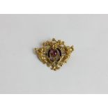 A gold, amethyst and enamel brooch, possibly French