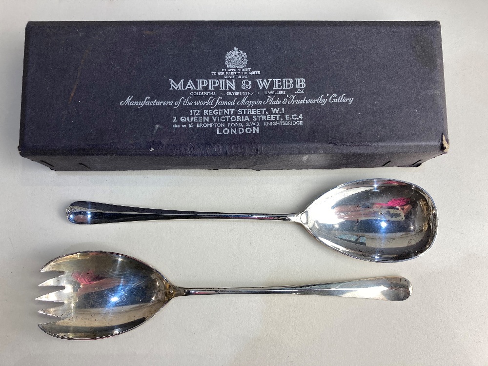 A pair of Elizabeth II silver old English pattern salad servers, makers Mappin & Webb, Sheffield