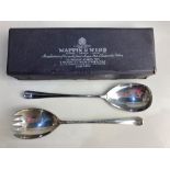 A pair of Elizabeth II silver old English pattern salad servers, makers Mappin & Webb, Sheffield