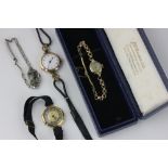 A lady's 9ct gold J W Benson bracelet watch; a silver bracelet watch; a lady's 18ct watch and