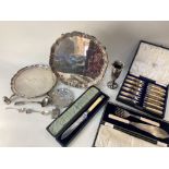 A collection of silver plated items, including two salvers, a cased set of six fish knives and