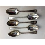 A set of five Victorian silver dessert spoons with beaded and Old English pattern handles,