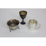 A George V silver egg cup, Sheffield 1924, a circular salt with scalloped border, Sheffield 1918 and