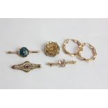 A pair of 9ct gold hoop earrings and four various brooches