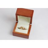 A 9ct two tone Clogau gold decorative ring in presentation box 3.8 g