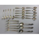A set of five Thai 925 sterling silver cake forks, a knife, three teaspoons and five coffee