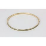 A 9ct gold and plaited silk bangle 14g gross