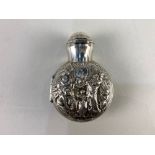 A Victorian embossed silver scent bottle case, maker William Comyns & Sons, London 1897, depicting