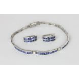 A sapphire and diamond bracelet in 18ct white gold and a pair of matched hoop earrings
