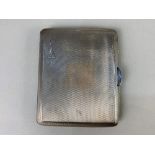 A George VI silver cigarette case, maker Cohen & Charles, Chester 1940, with gilt interior,