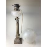 A Victorian silver Corinthian column oil lamp (converted), maker William Gibson & John Lawrence