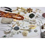 A quantity of costume jewellery including some silver items and base metal watches