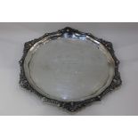 A Canadian sterling silver circular salver by Birks with shell and scroll gadrooned border and