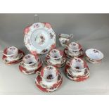 A Paragon porcelain tea set for six, comprising six, cups, saucers and tea plates, a cake plate, a