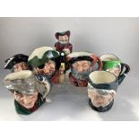 Seven Royal Doulton character jugs, Sairey Gamp, Falstaff, Sancho Panca, The Poacher, Granny,