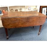 A Victorian mahogany Pembroke table with single end drawer on reeded tapering legs, 111cm