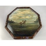 Horseracing interest, an oak painted panel decorated with a jockey on horseback in a landscape,