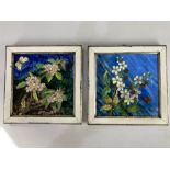 Two framed 19th century glazed pottery tiles, decorated with blossom and butterflies, one with