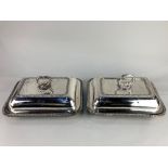 A matched pair of silver plated rectangular tureens and covers, with gadroon border and scrolling