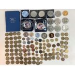 A collection of early 20th century and later British and international coinage, to include crowns,
