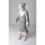A Chinese grey pottery figure of a male Attendant, possibly Han Dynasty, 44cm high (a/f)