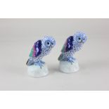 A pair of Herend porcelain models of owls, with blue fishnet bodies, 12cm high