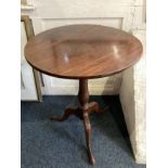 A George III mahogany circular occasional table on baluster stem and tripod base, 58cm