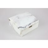 A marble cigarette box, the lid with plaque stating 'Made from marble taken from the walls of The