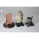 Three items of Antiquarian interest, comprising a pottery head of Buddha, possibly from Pakistan 3rd